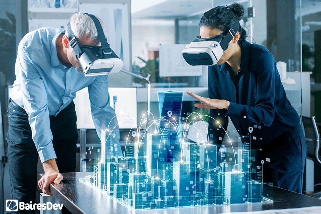 Male and Female software engineers with Virtual Reality Headsets working on Smart City Hologram